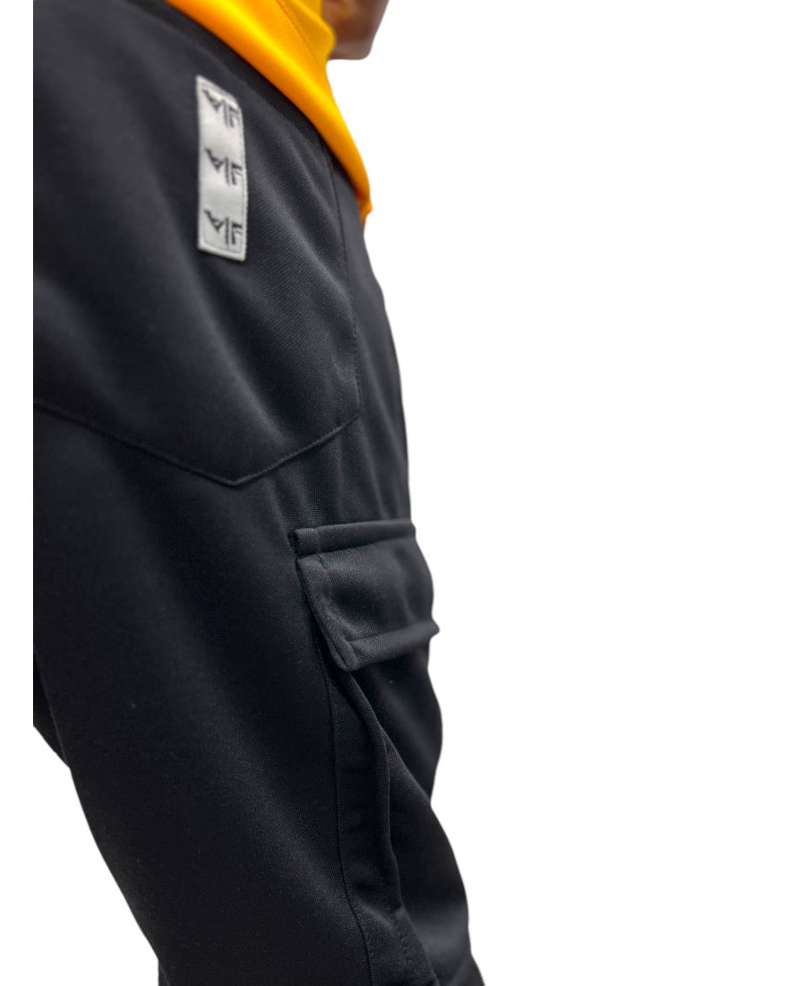 Black trousers with side pockets and zips as design