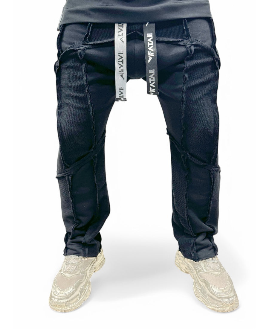 Black trousers with multiple sewings, large