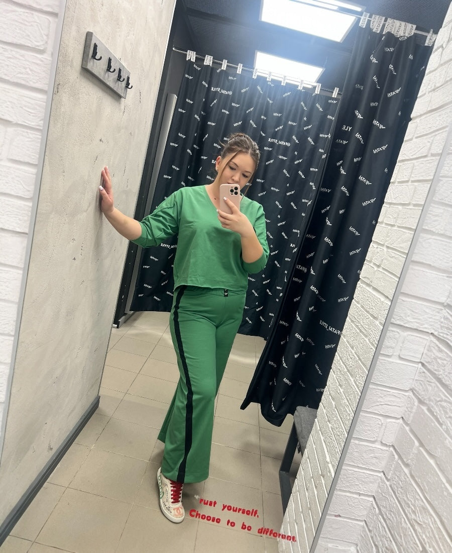 Green tracksuit with black details