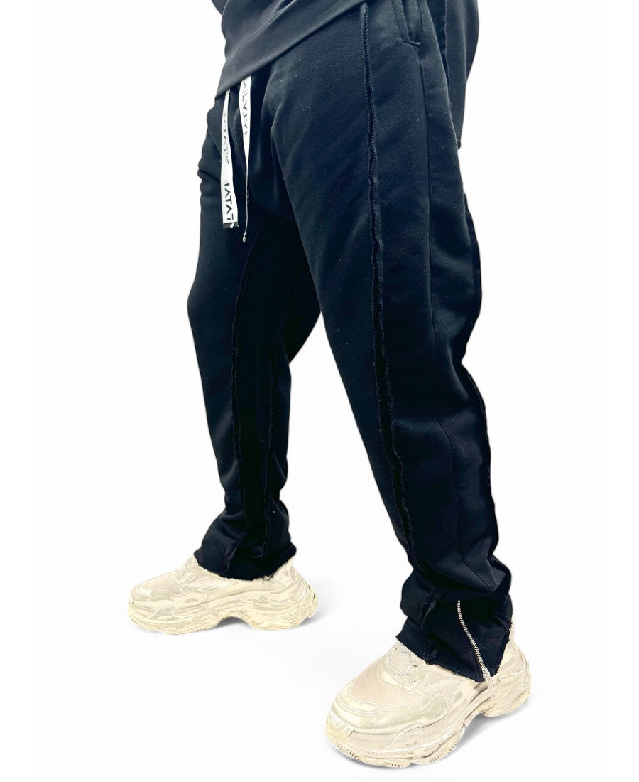 Black trousers with multiple sewings and zips, large
