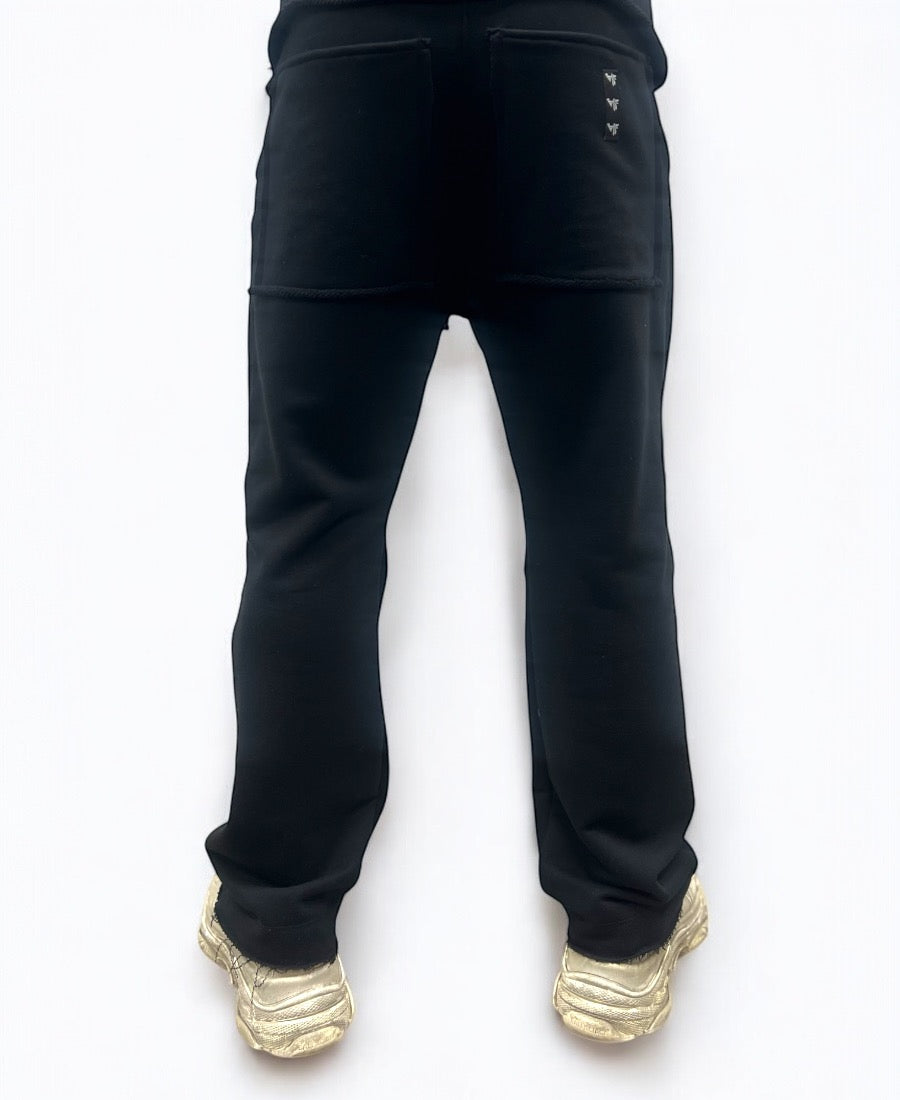 Black trousers with modern design to the knee