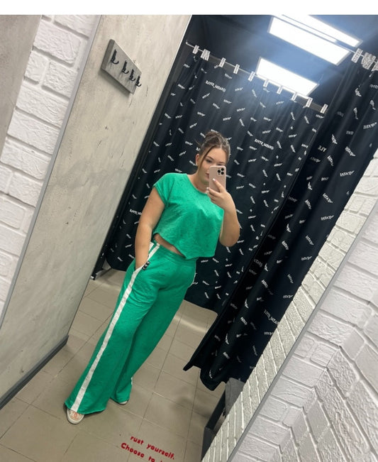 Green tracksuit with white details