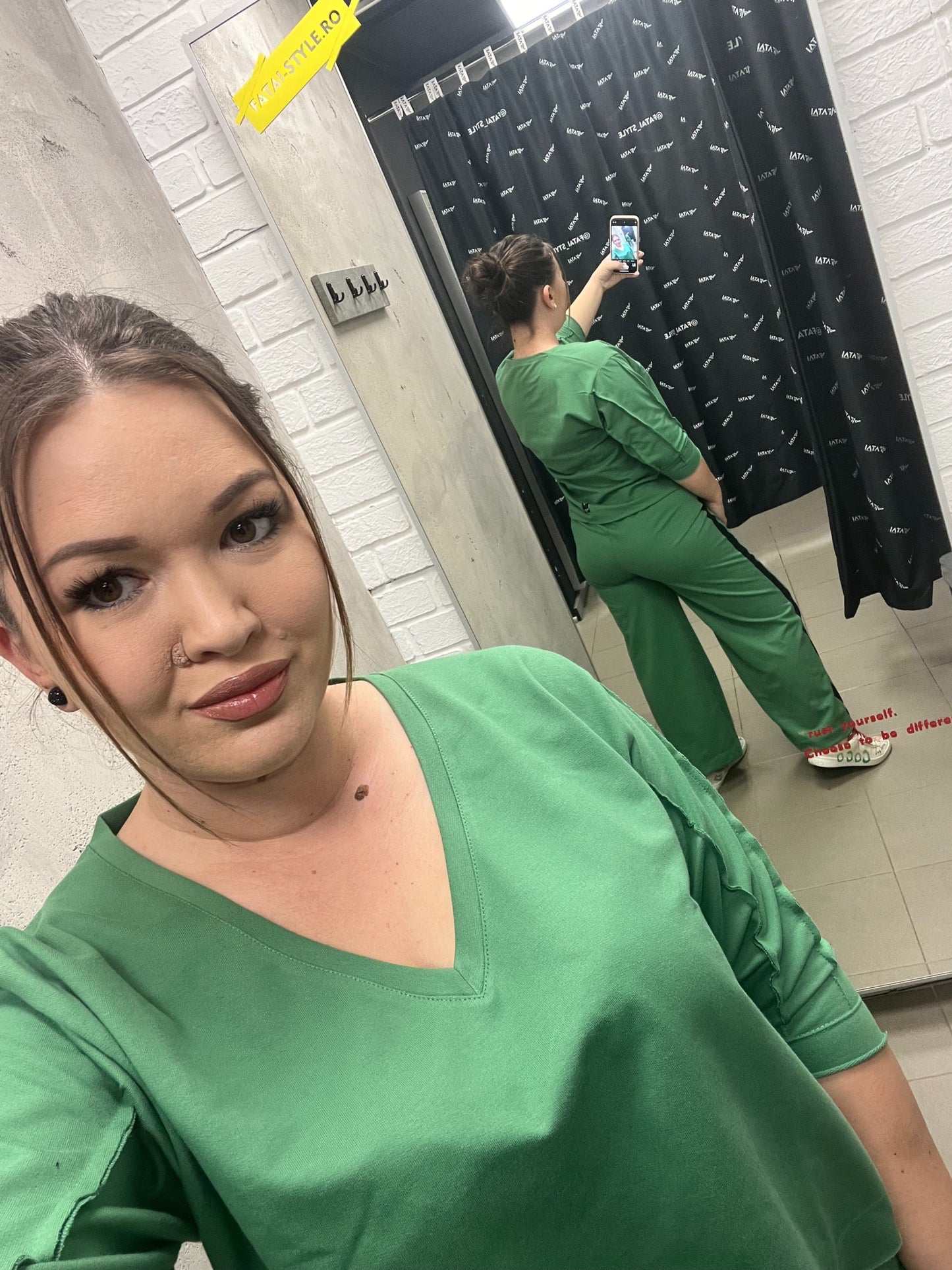 Green tracksuit with black details