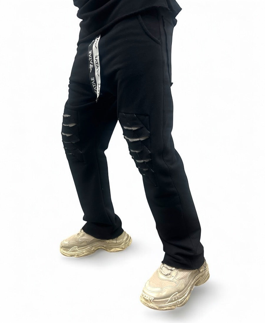 Black trousers with modern design to the knee