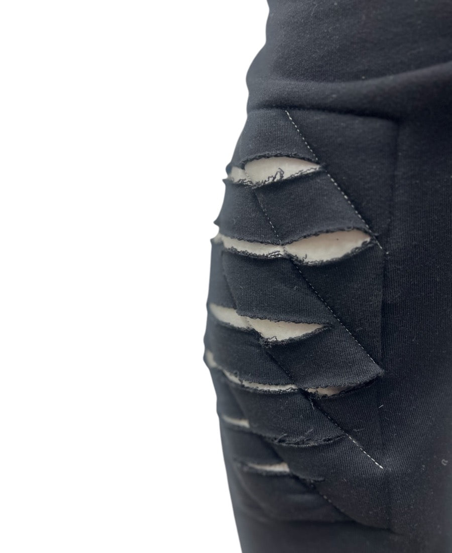 Black trousers with modern design to the knee