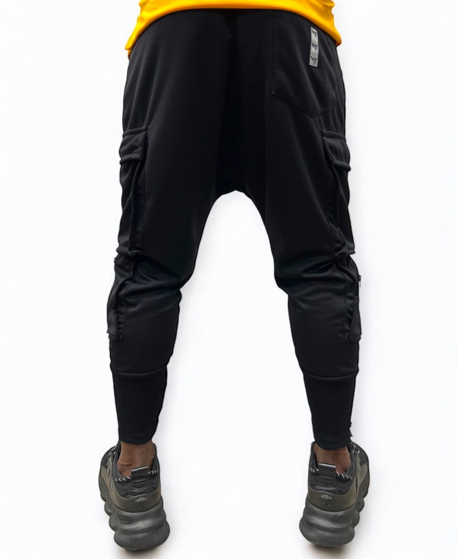 Black trousers with side pockets and zips as design