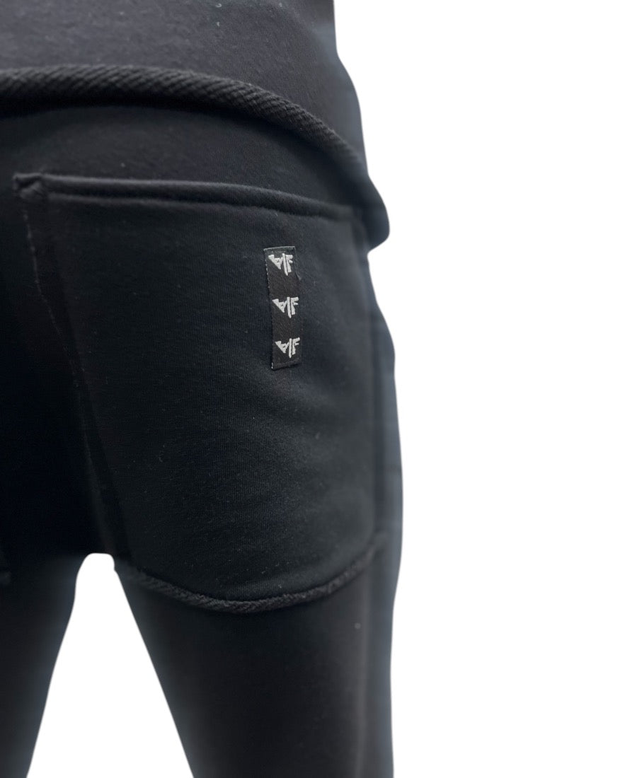 Black trousers with modern design to the knee