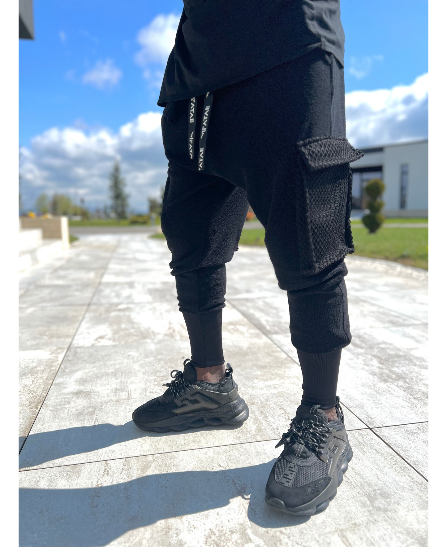 Black trousers with net on the pockets