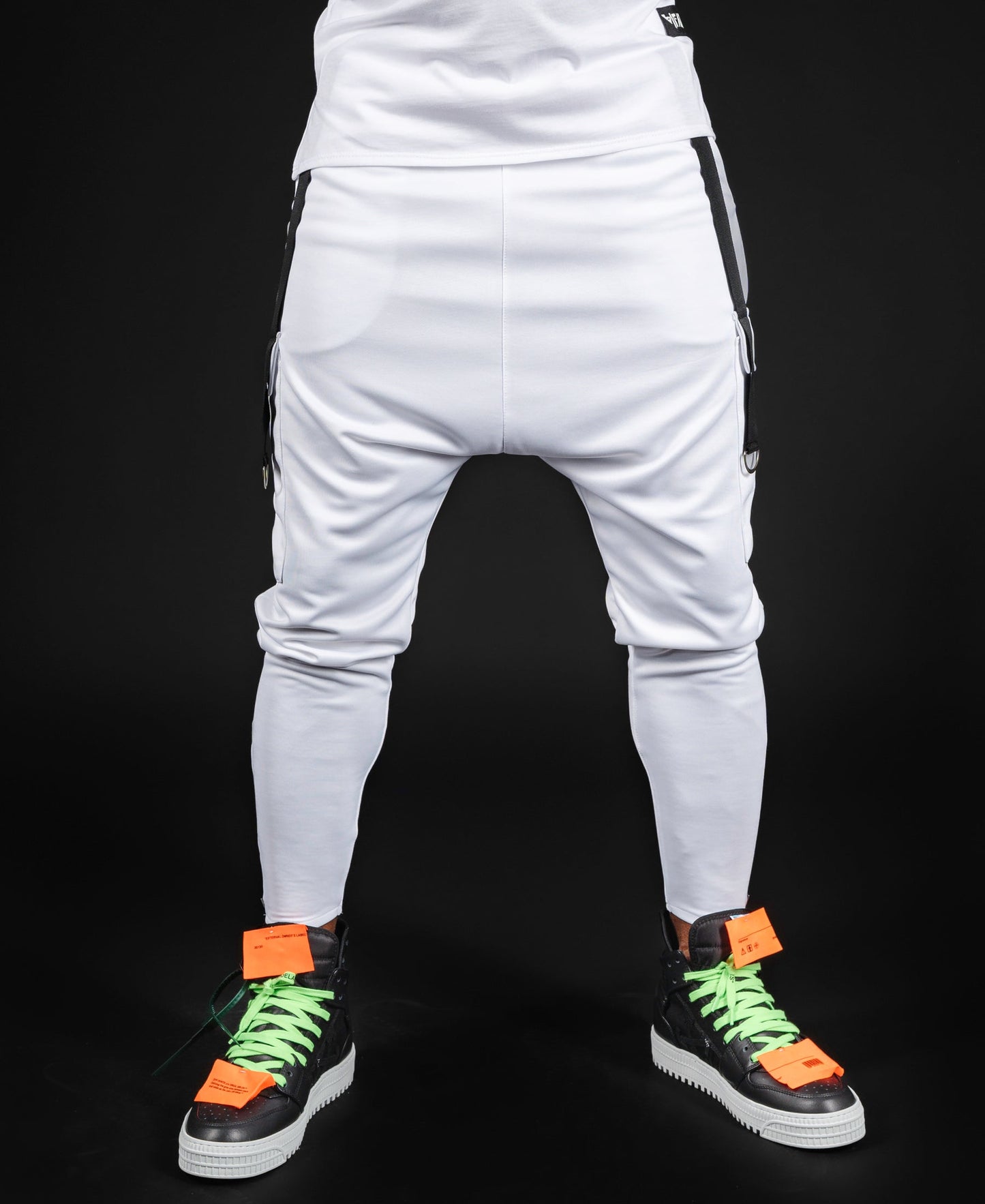White trousers with black accesories