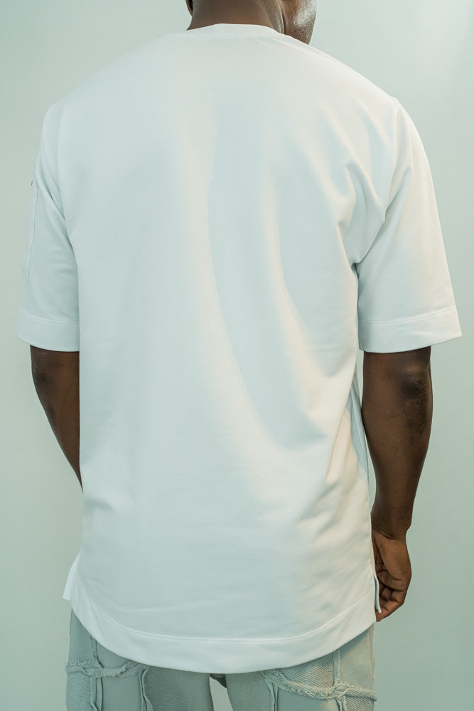 White t-shirt with zip on the hand