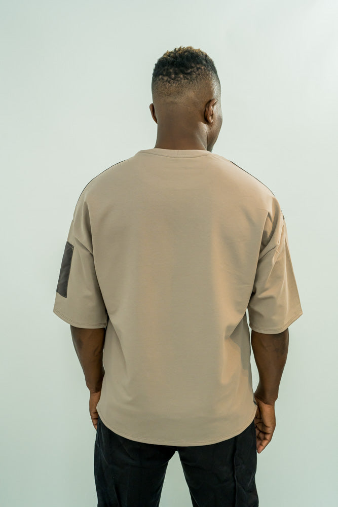 Cappuccino t-shirt with different materials and zip on the hand