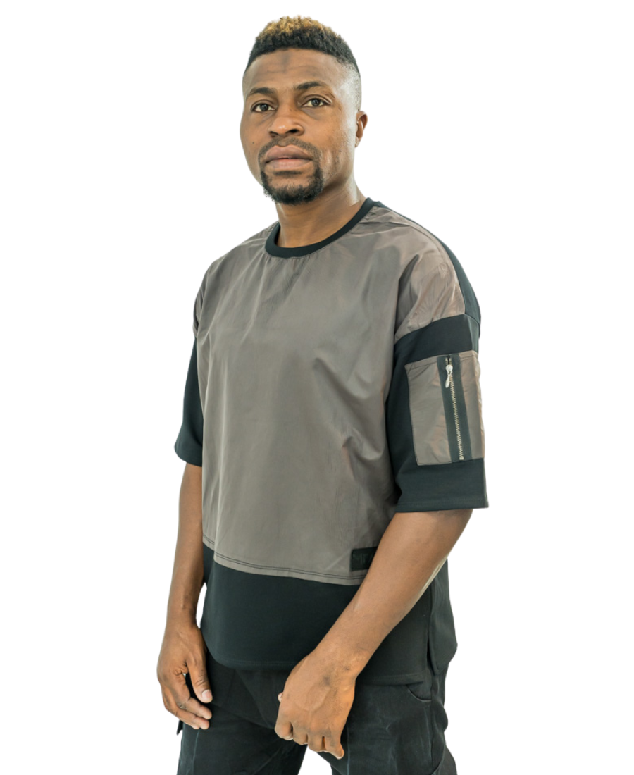 Black t-shirt combined with different material and with zip on the hand
