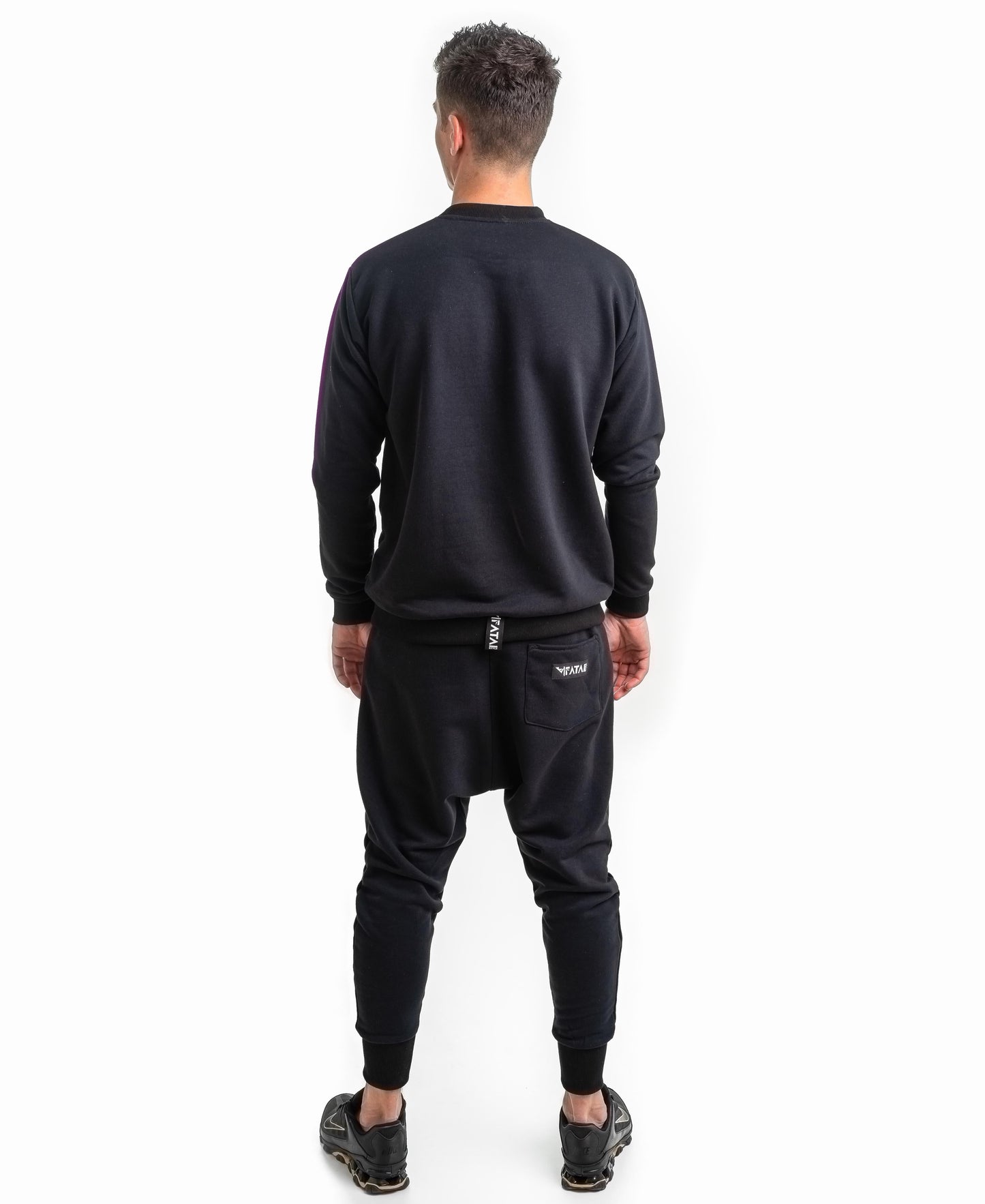 Black tracksuit with printed text