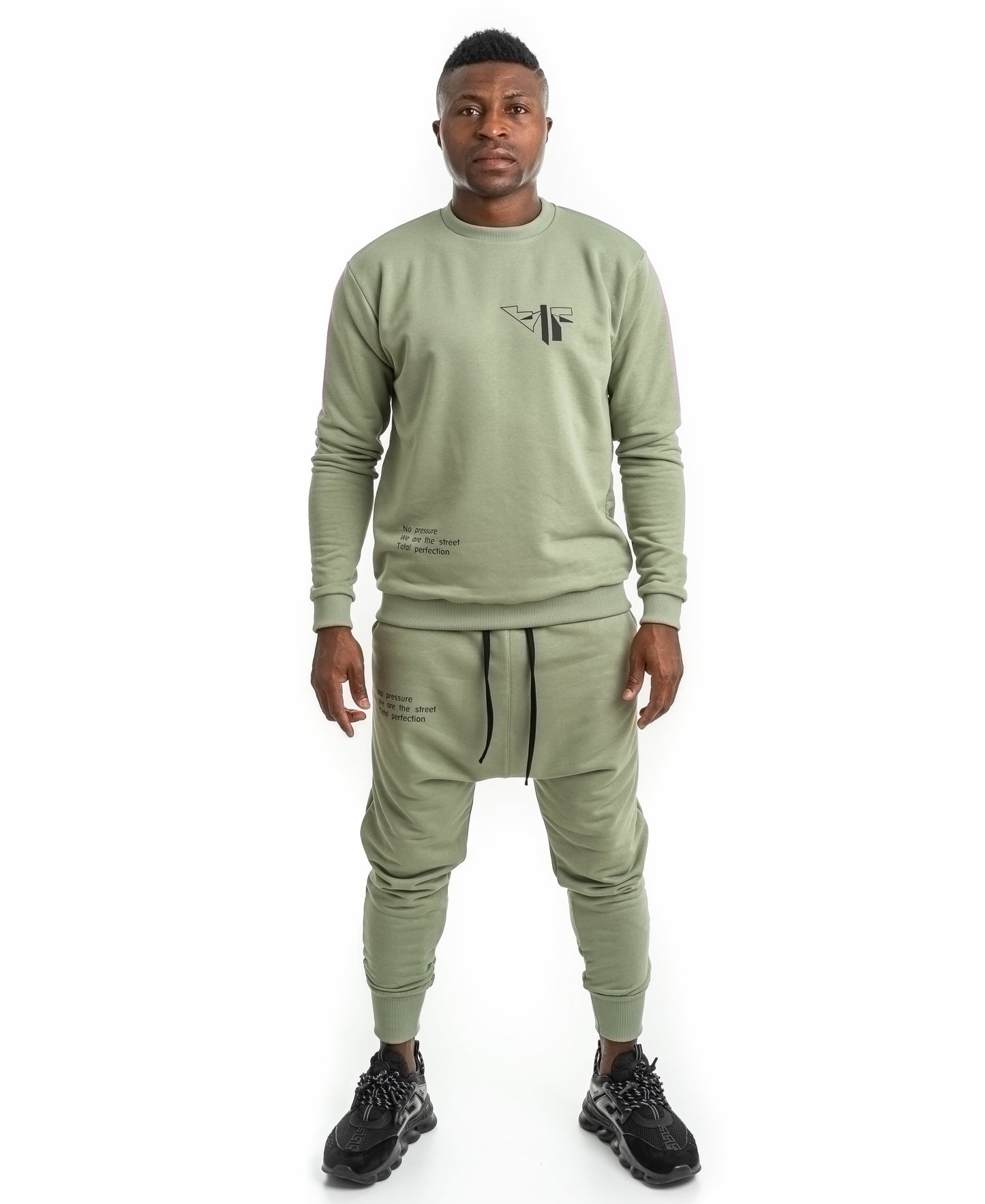 Green tracksuit with printed text