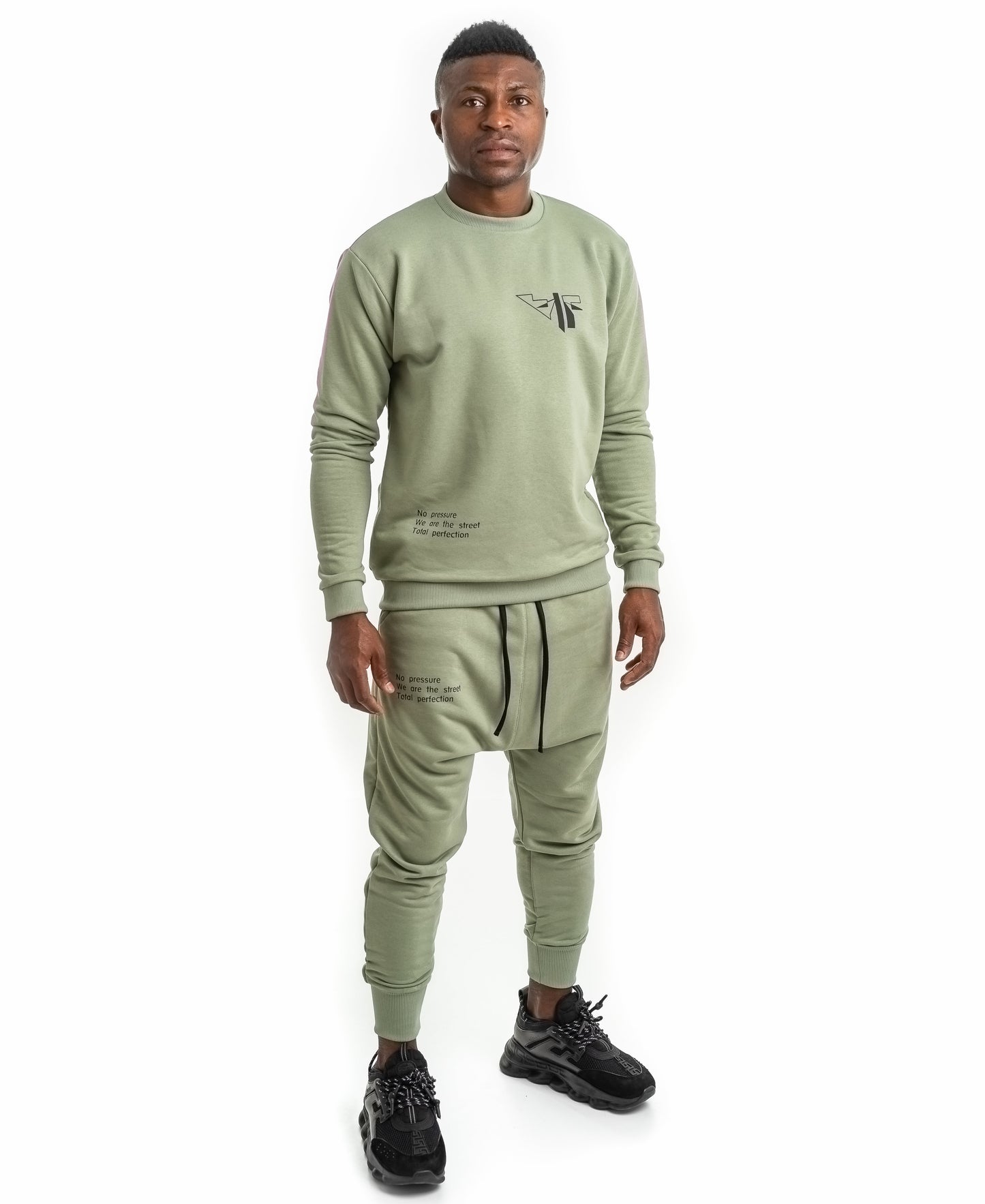 Green tracksuit with printed text