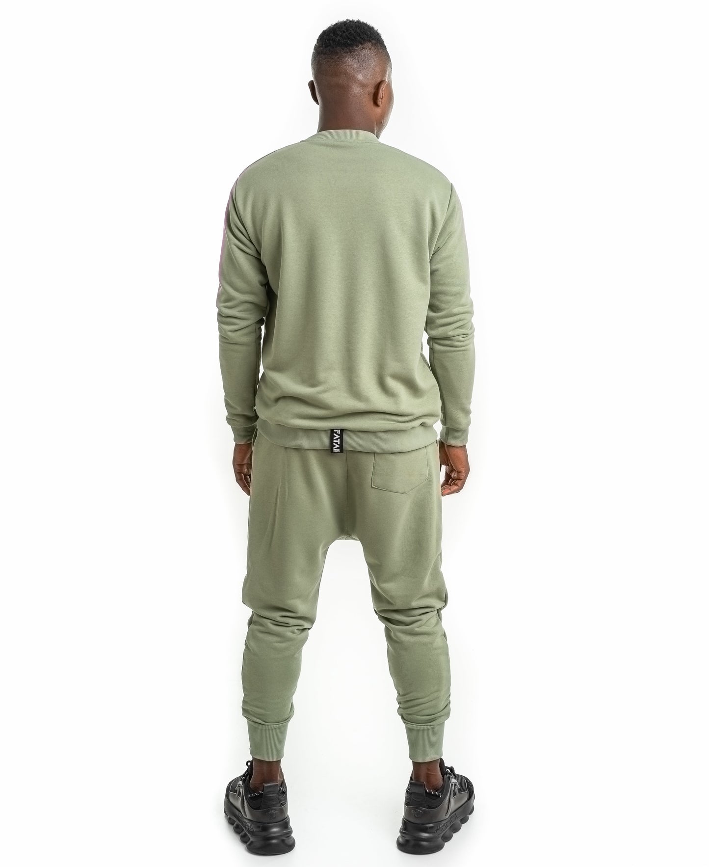 Green tracksuit with printed text