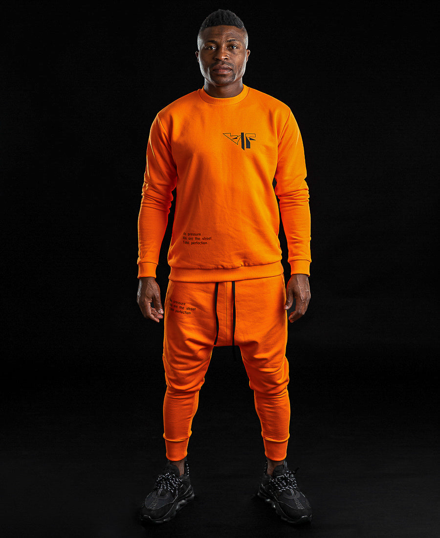 Orange tracksuit with printed text