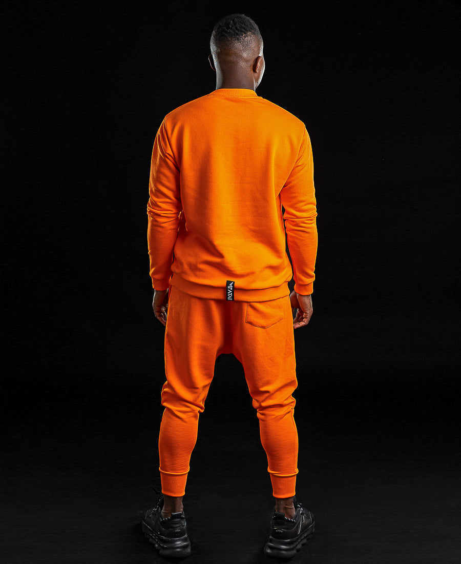 Orange tracksuit with printed text