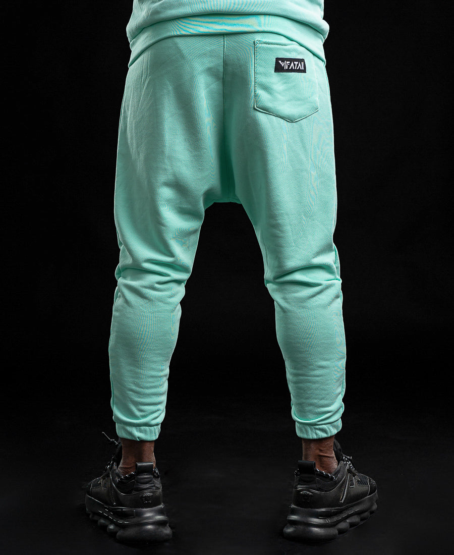 Pantaloni verde menta cu fermoar la buzunare