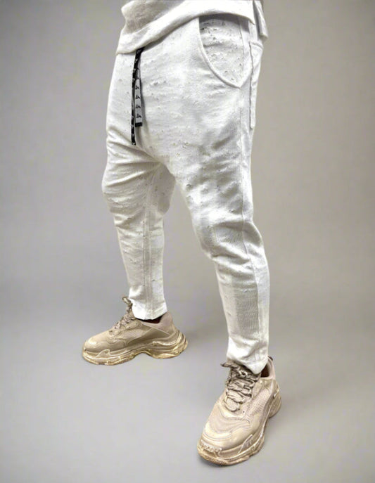 White trousers with special texture and vertical lines as design