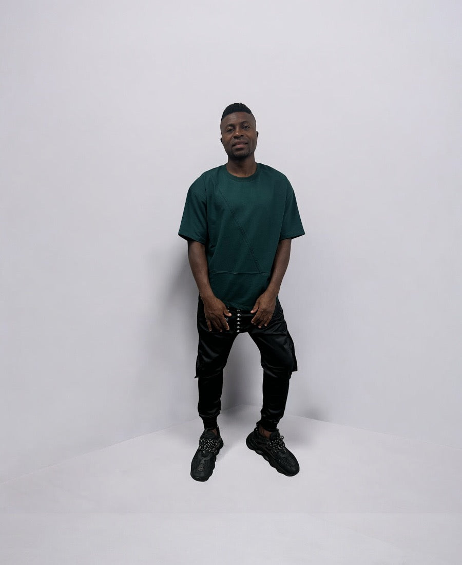 Black trousers made with shiney material and side pockets