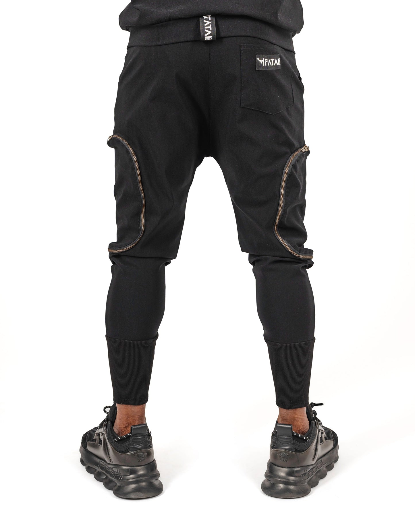 Black trousers with removable side pockets