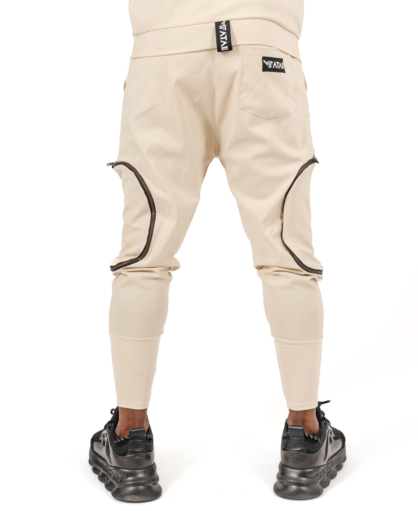 Cream trousers with removable pockets