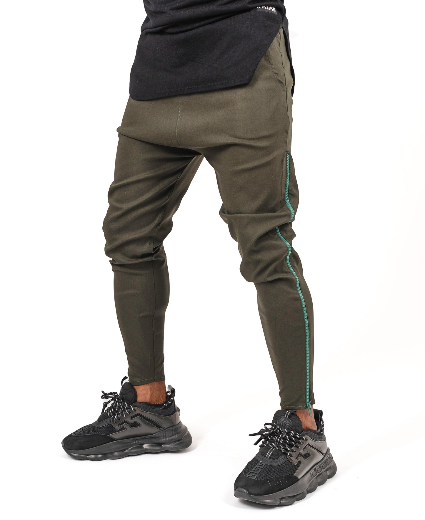 Khaki trousers with long green side zip
