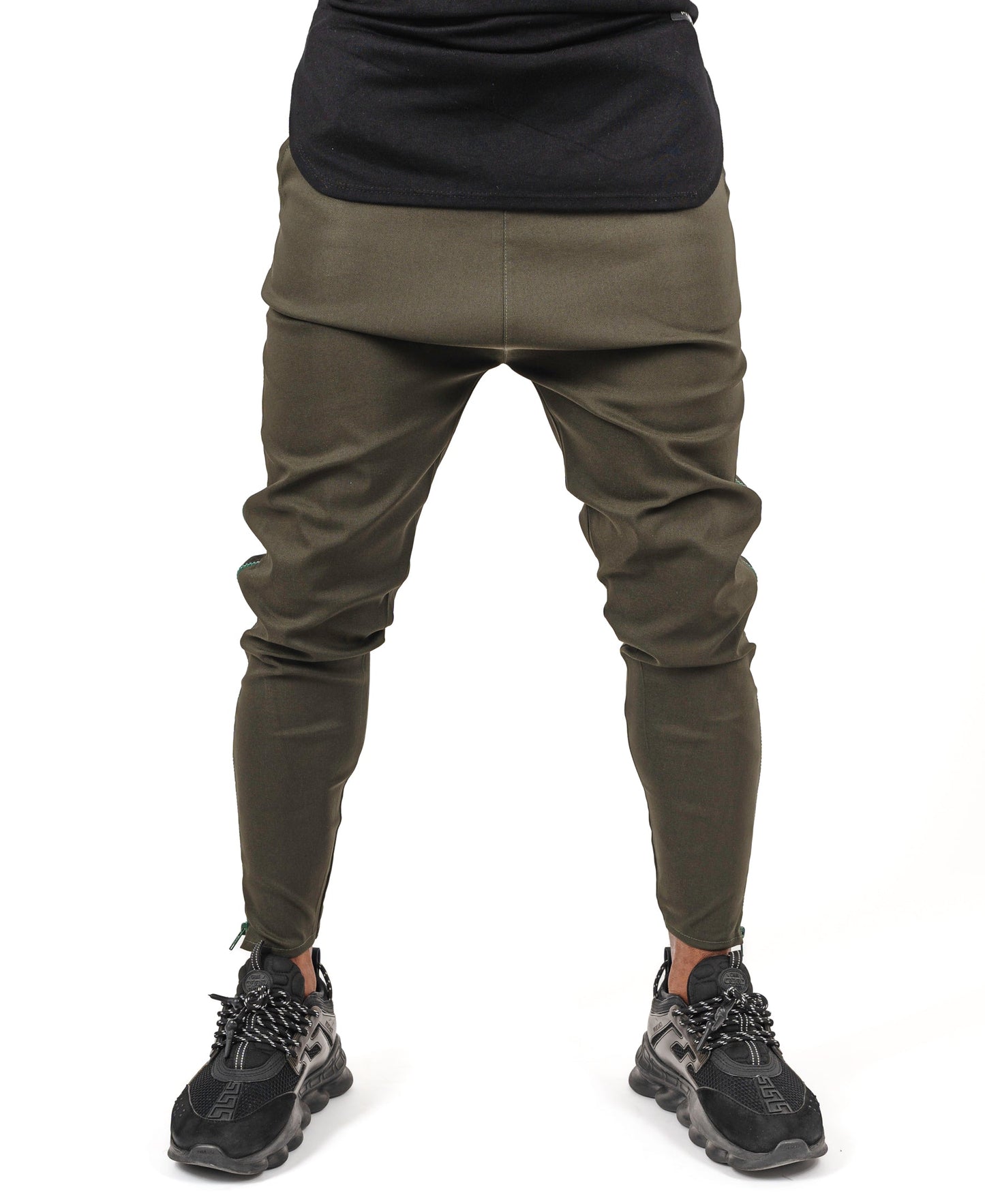 Khaki trousers with long green side zip