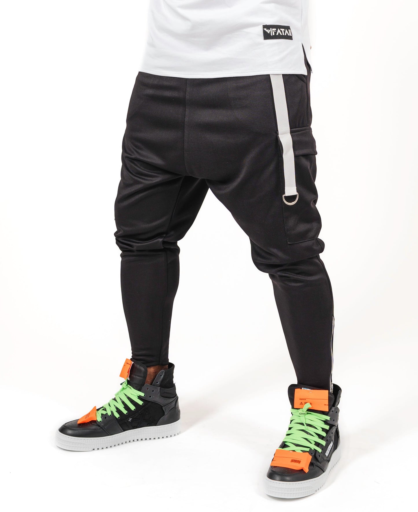 Black trousers with white accesories