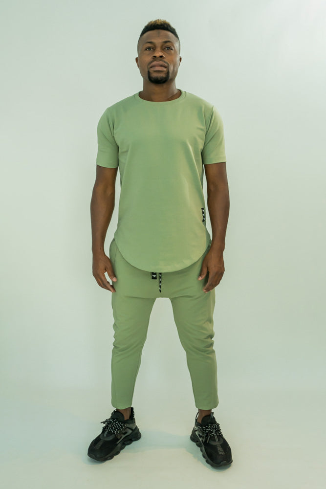 Tricou verde cu design rotund si tiv lat