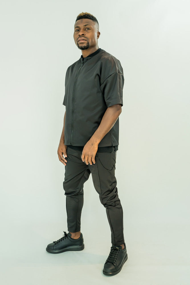 Black casual/elegant trousers with removable chain