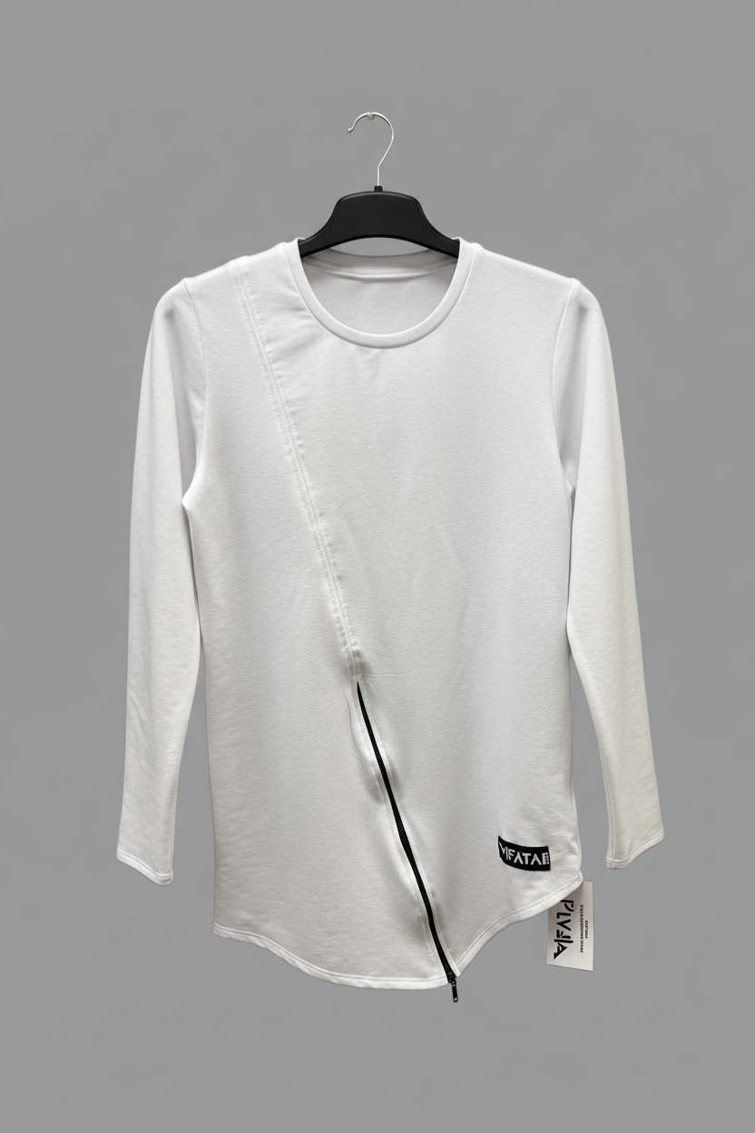 A white long-sleeve top with an asymmetrical diagonal seam and a black zipper detail, hanging on a black hanger against a textured gray concrete wall.