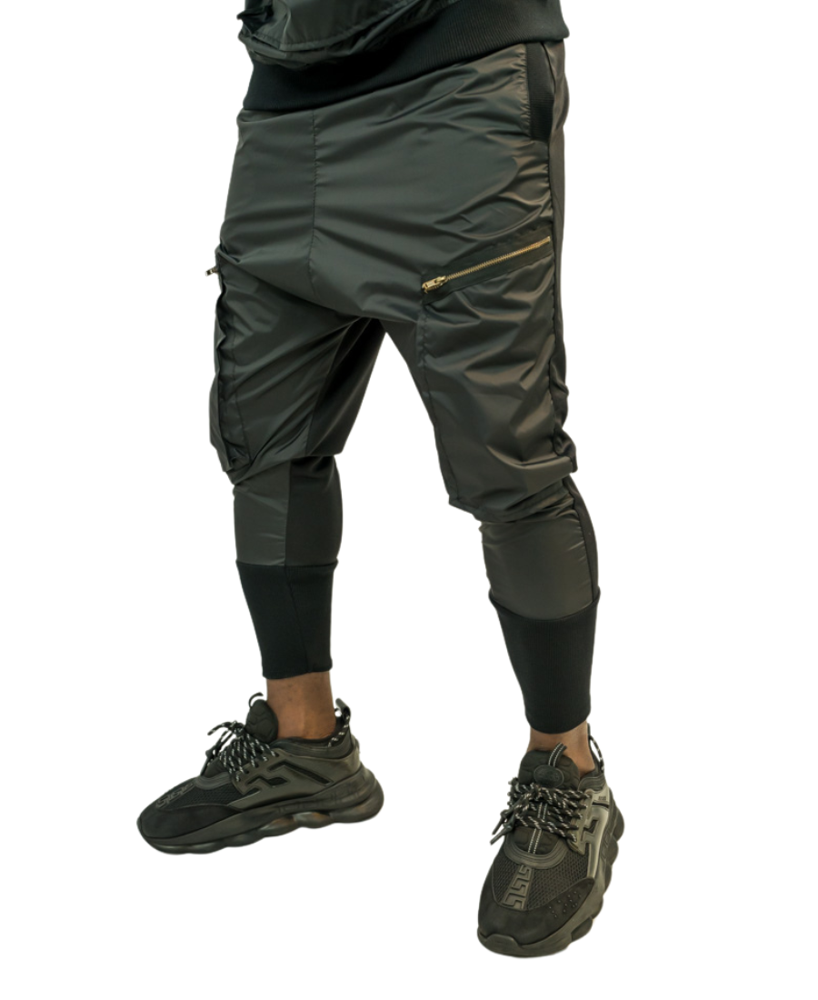 Black trousers with different combination of texture and attached zips