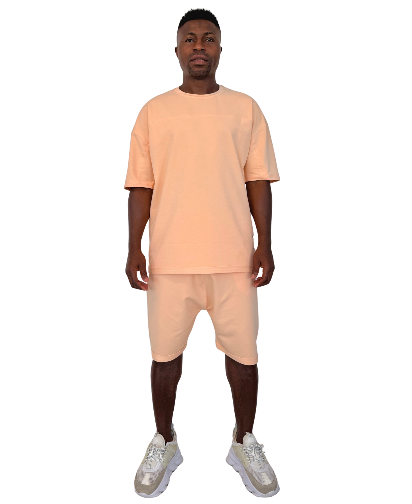 Tricou cu diverse cusaturi in nuanta somon