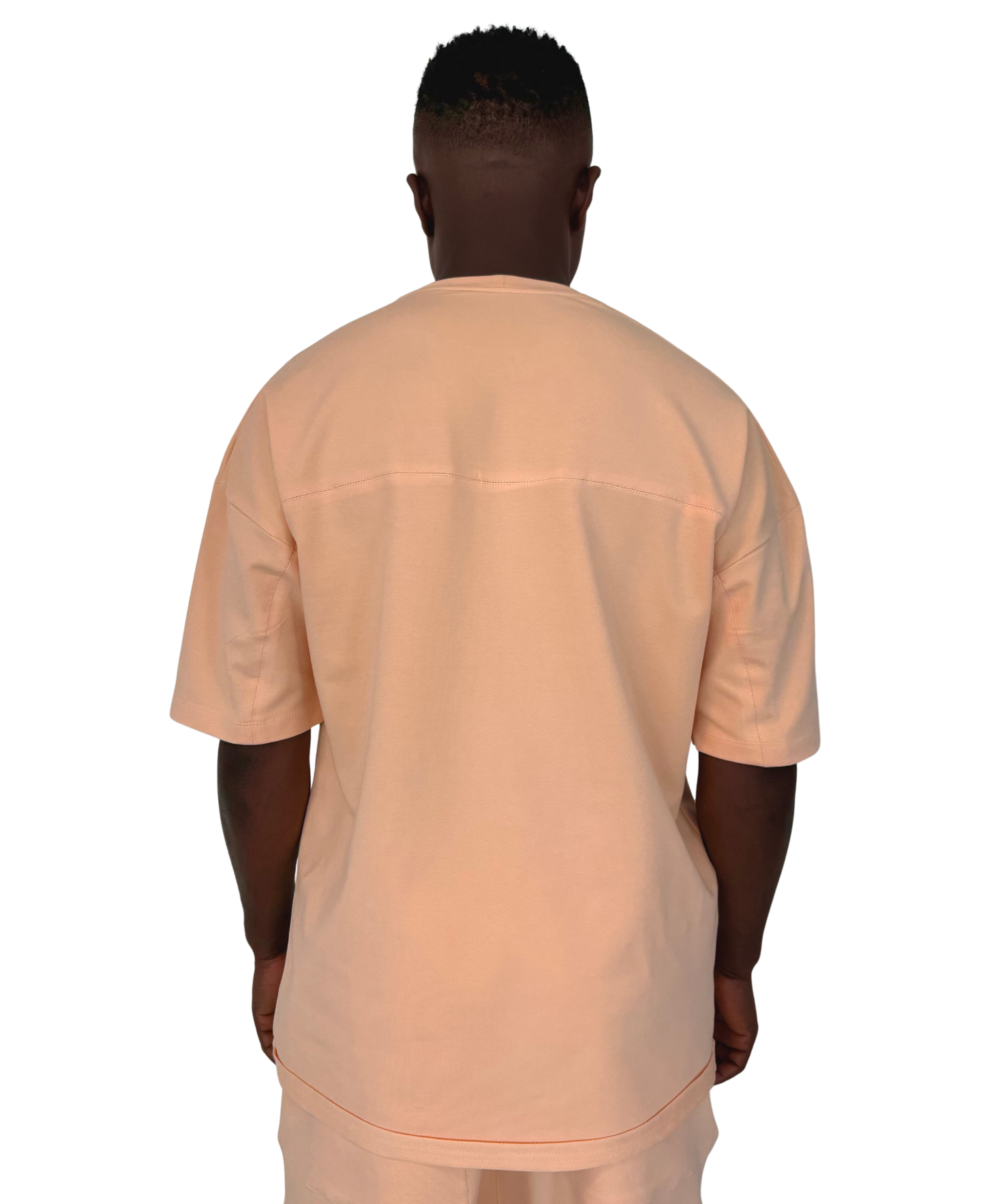 Tricou cu diverse cusaturi in nuanta somon