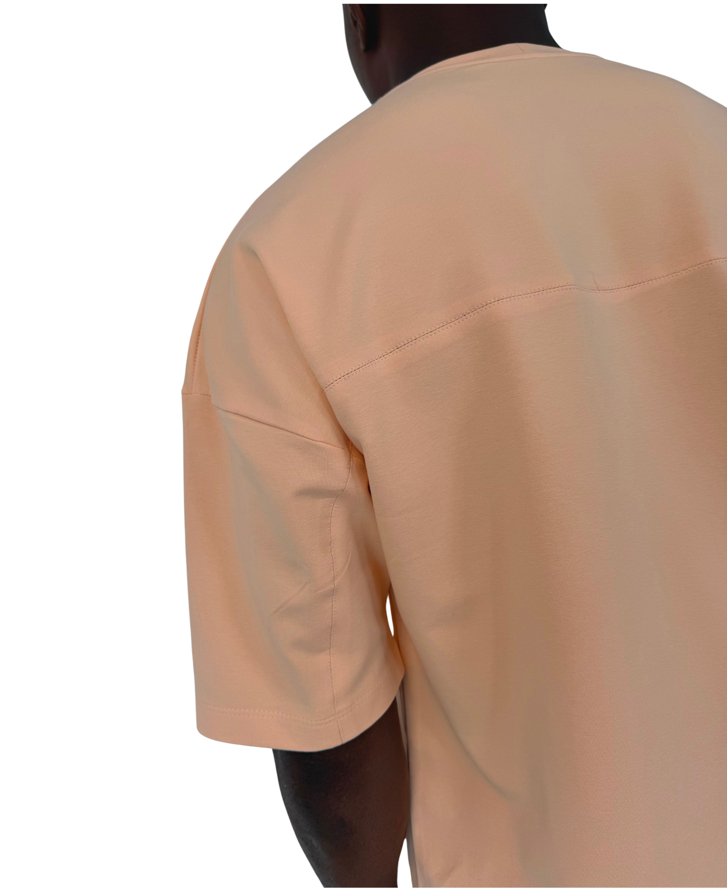 Tricou cu diverse cusaturi in nuanta somon