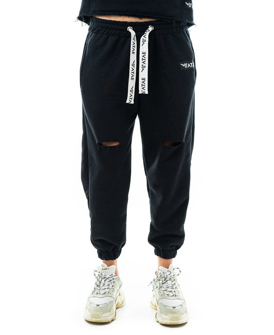 Pantaloni negri cu o taietura pe picior si elastec la glezna