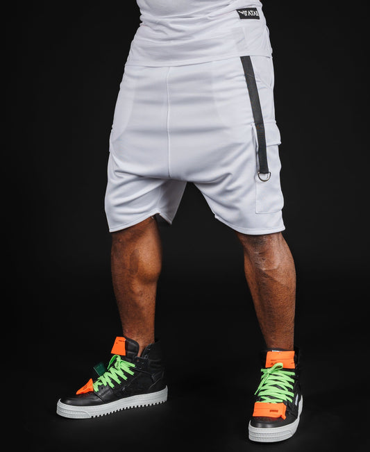 Pantaloni albi cu accesorii negre