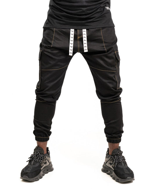 Pantaloni negri cu diverse cusaturi maro tip blugi