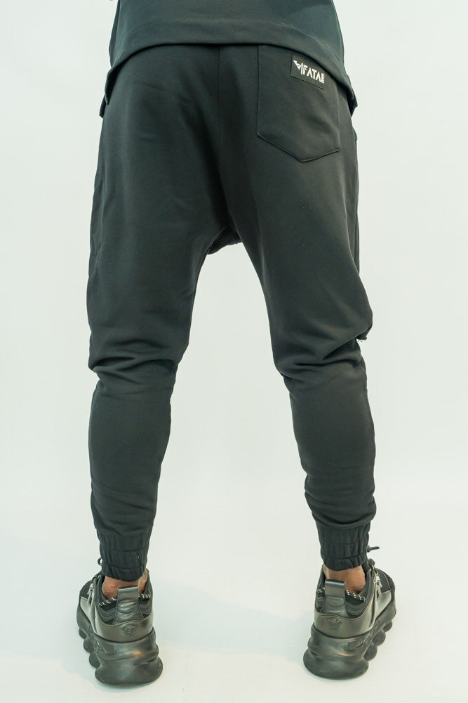 Pantaloni negri cu taietura la genunchi