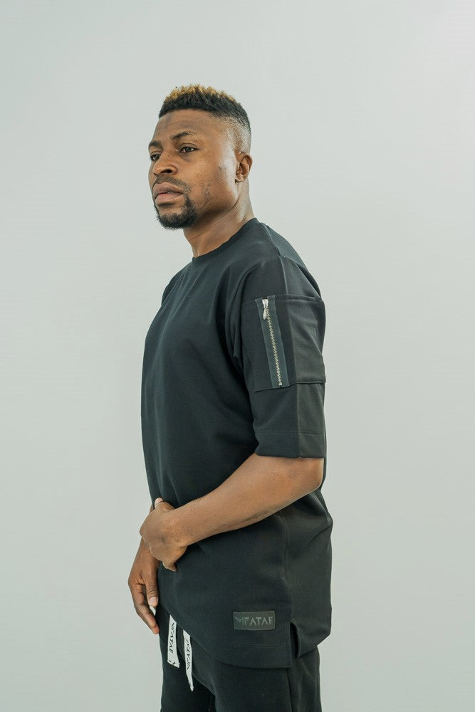 Black t-shirt with zip on the hand