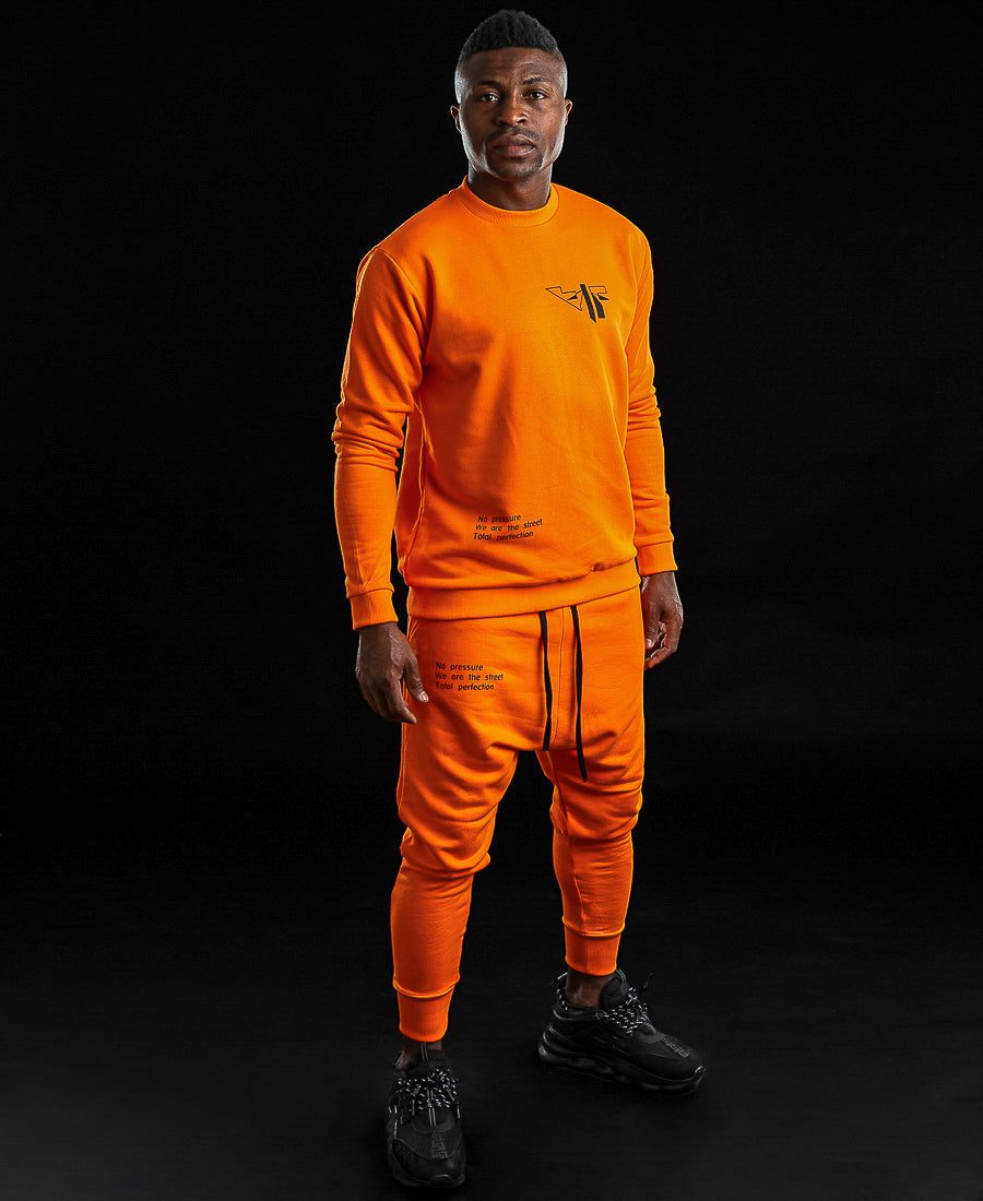 Orange tracksuit with printed text