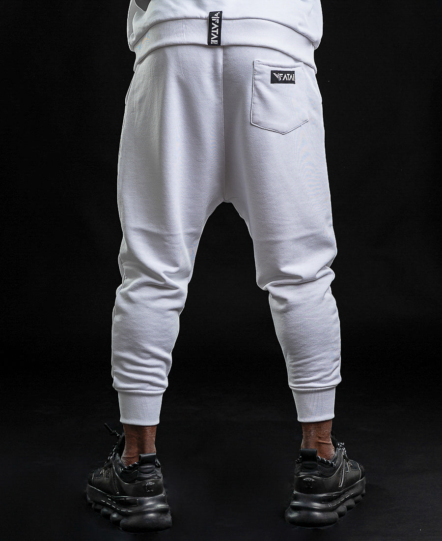 White trousers with printed text