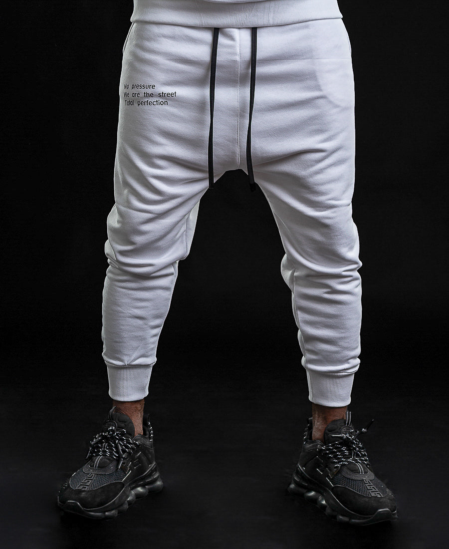 White trousers with printed text