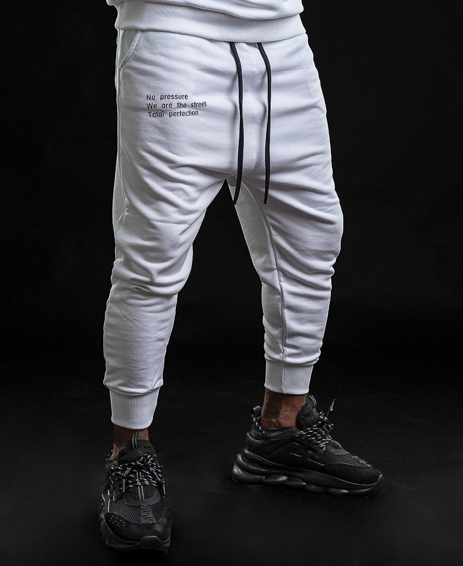 White trousers with printed text